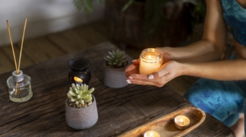 high-angle-woman-holding-candle